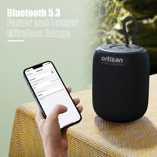 Enceinte Bluetooth noire Ortizan avec smartphone connectée, textile et design portable