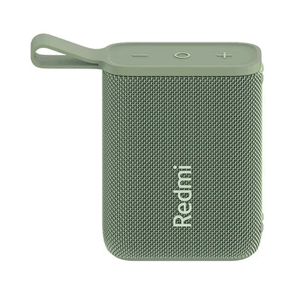 Enceinte Bluetooth portable verte Redmi avec bouton volume et prise en main facile